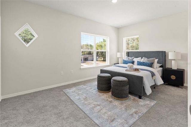 carpeted bedroom with recessed lighting and baseboards