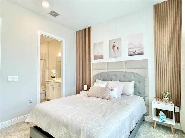 10275 Park Estates Ave, Orlando, FL 32836 - carpeted bedroom with baseboards, connected bathroom, and visible vents