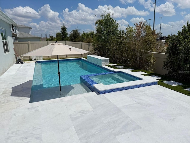 10275 Park Estates Ave, Orlando, FL 32836 - view of swimming pool featuring a fenced backyard, a patio area, and a pool with connected hot tub