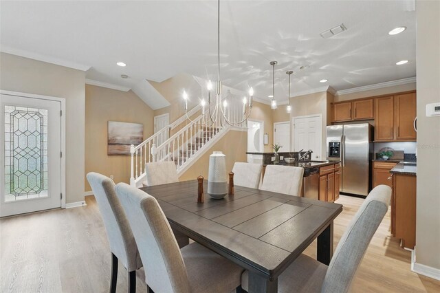 dining space with light wood-type flooring, recessed lighting, stairs, and crown molding