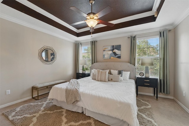 5341 Via Appia Way, Sanford, FL 32771 - carpeted bedroom with crown molding, baseboards, ceiling fan, and a tray ceiling