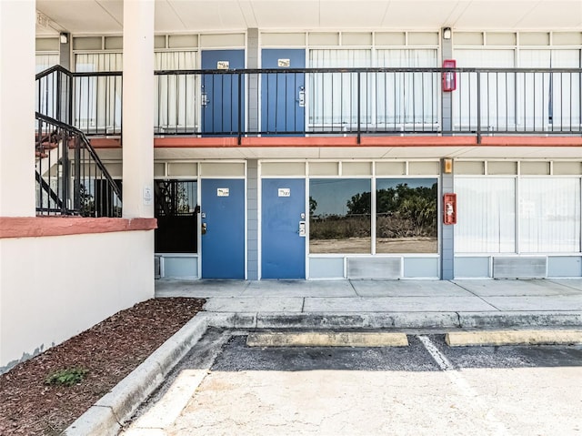 43420 Hwy 27 Unit 121, Davenport, FL 33837 - view of exterior entry featuring uncovered parking