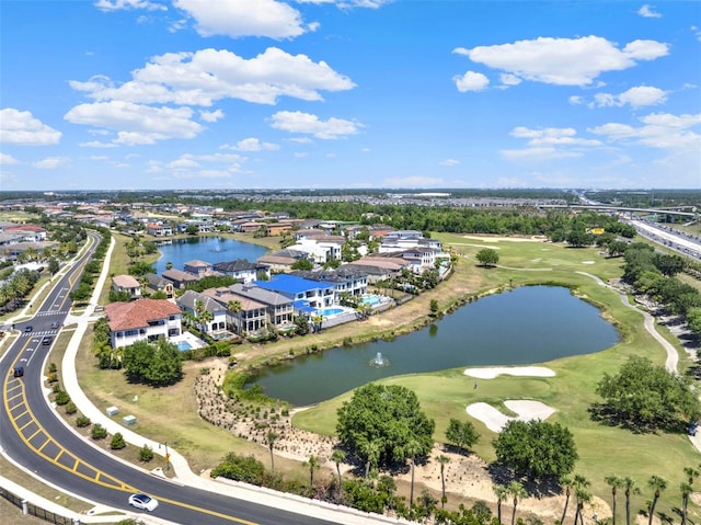 971 Golden Bear Dr, Reunion, FL 34747 - birds eye view of property with a residential view, a water view, and view of golf course