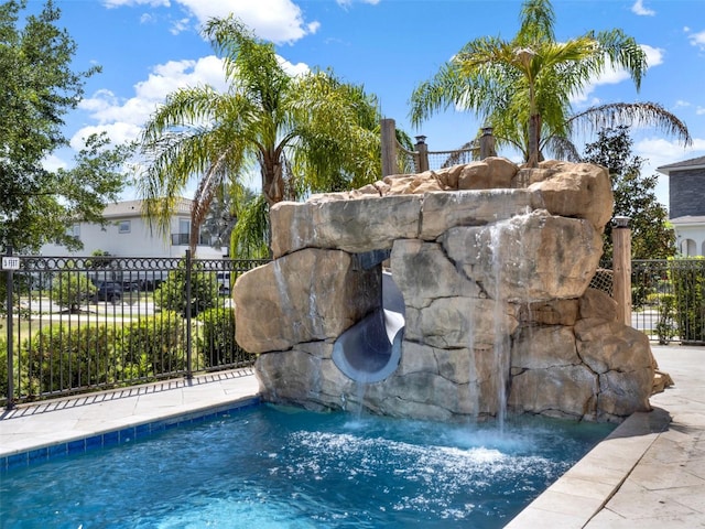 971 Golden Bear Dr, Reunion, FL 34747 - view of swimming pool featuring fence