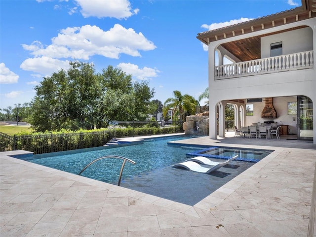 971 Golden Bear Dr, Reunion, FL 34747 - view of swimming pool with outdoor dining area, a patio area, and a fenced in pool