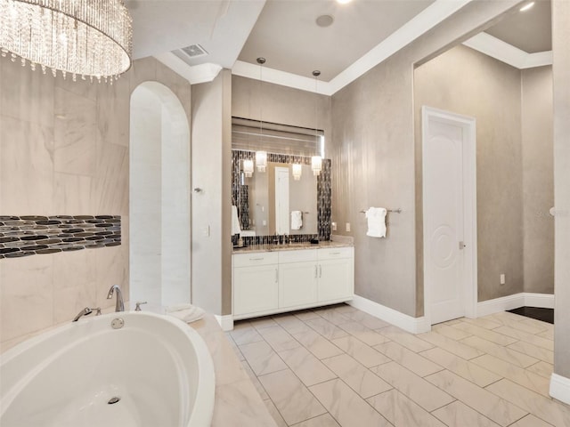 971 Golden Bear Dr, Reunion, FL 34747 - full bath with a garden tub, vanity, a chandelier, baseboards, and visible vents