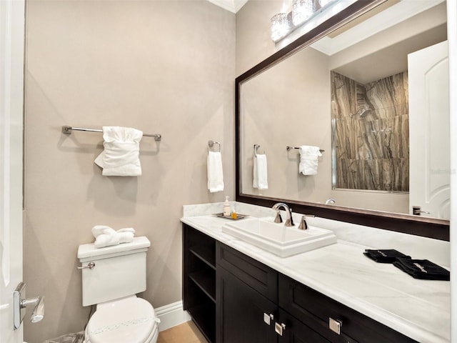 971 Golden Bear Dr, Reunion, FL 34747 - full bathroom with crown molding, vanity, walk in shower, baseboards, and toilet