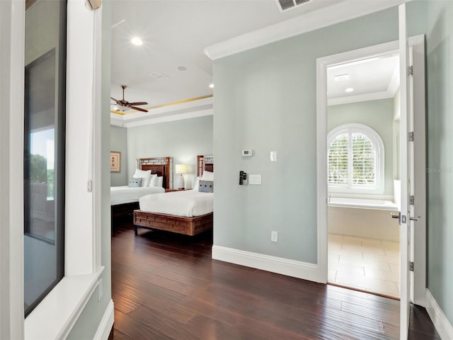 971 Golden Bear Dr, Reunion, FL 34747 - bedroom with dark wood-style flooring, baseboards, recessed lighting, and crown molding