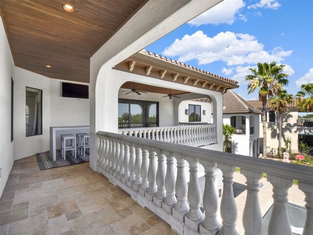 971 Golden Bear Dr, Reunion, FL 34747 - balcony featuring a porch and ceiling fan