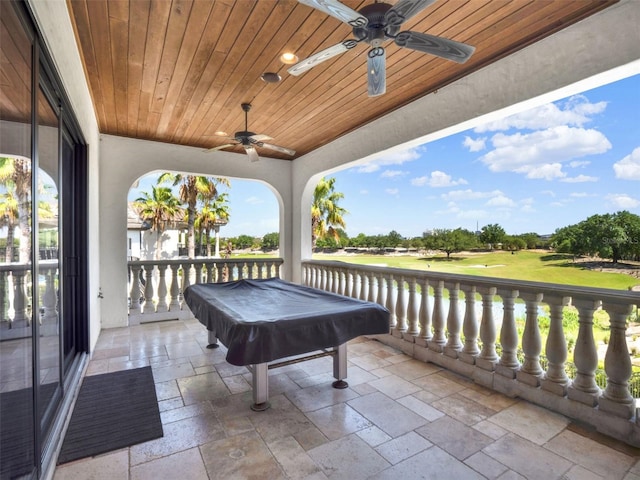 971 Golden Bear Dr, Reunion, FL 34747 - view of patio / terrace with ceiling fan and view of golf course