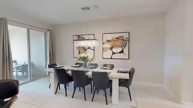 dining area with plenty of natural light