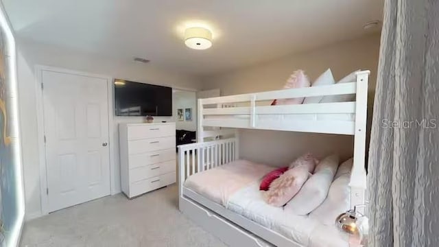 bedroom with finished concrete floors