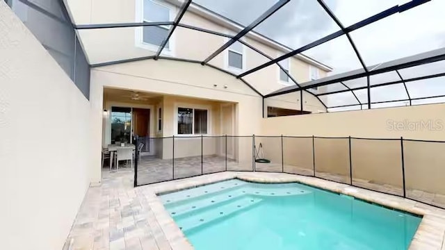 view of pool with a fenced in pool