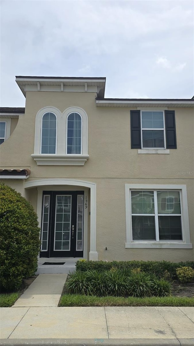 1569 Carey Palm Cir, Kissimmee, FL 34747 - view of front of house featuring stucco siding