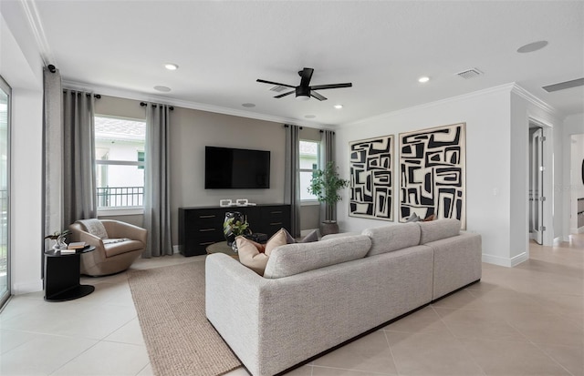 2741 Serenity Meadow Dr, Kissimmee, FL 34744 - living area featuring plenty of natural light, visible vents, ceiling fan, and light tile patterned floors