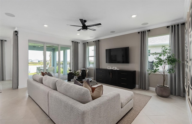 2741 Serenity Meadow Dr, Kissimmee, FL 34744 - living room with recessed lighting, ornamental molding, light tile patterned floors, baseboards, and ceiling fan