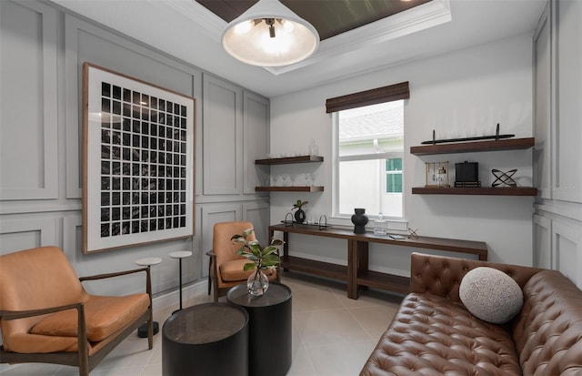 2741 Serenity Meadow Dr, Kissimmee, FL 34744 - sitting room featuring crown molding, a tray ceiling, and light tile patterned flooring