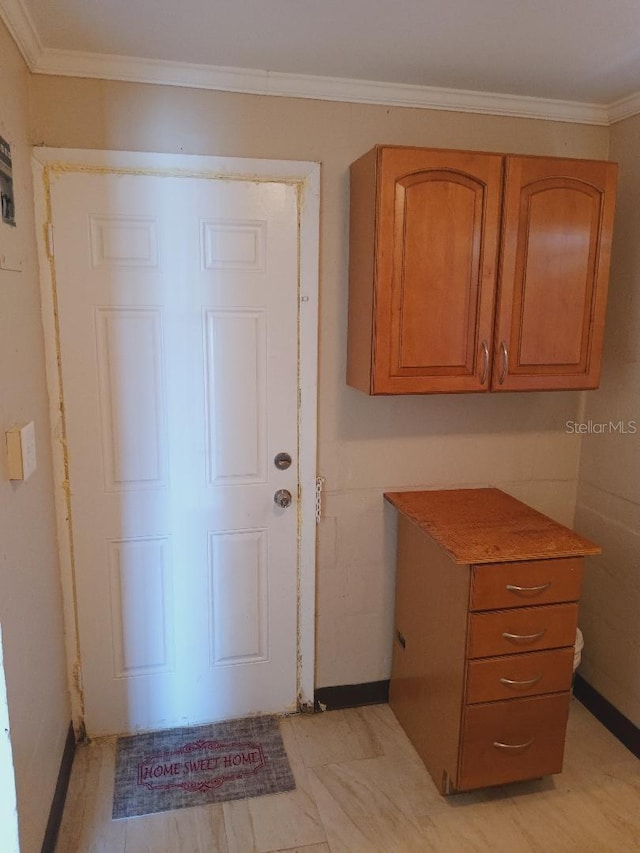 foyer entrance with ornamental molding
