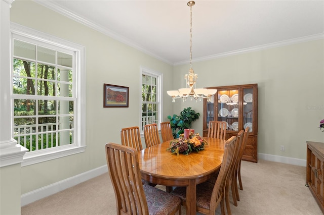 4000 Rouse Rd, Orlando, FL 32817 - dining area with crown molding, a notable chandelier, light colored carpet, and baseboards
