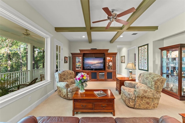 4000 Rouse Rd, Orlando, FL 32817 - living room featuring beamed ceiling, visible vents, coffered ceiling, carpet, and a ceiling fan