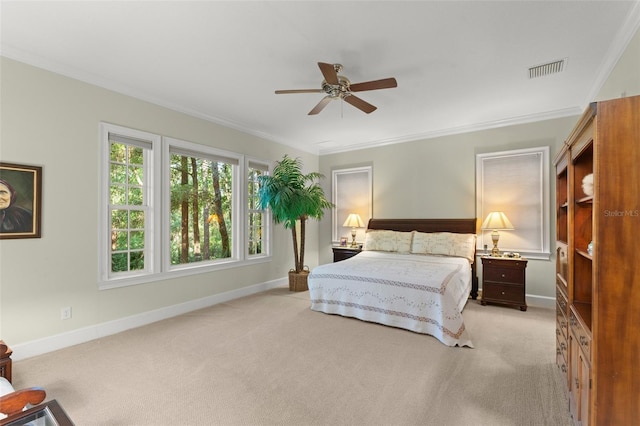 4000 Rouse Rd, Orlando, FL 32817 - bedroom with crown molding, a ceiling fan, visible vents, light carpet, and baseboards