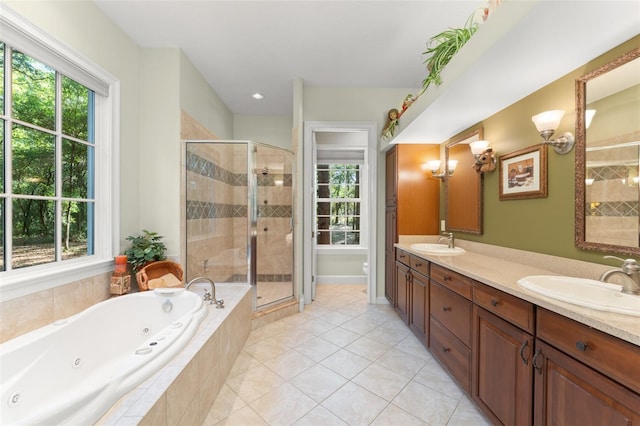 4000 Rouse Rd, Orlando, FL 32817 - bathroom with a stall shower, double vanity, a whirlpool tub, and a sink