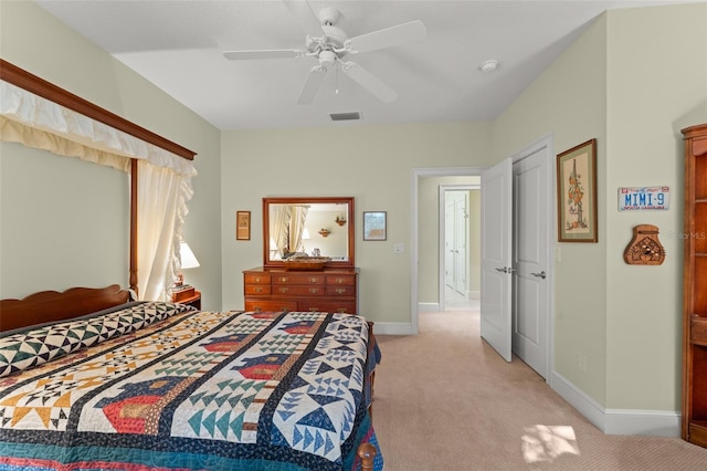 4000 Rouse Rd, Orlando, FL 32817 - bedroom with visible vents, ceiling fan, baseboards, and light carpet