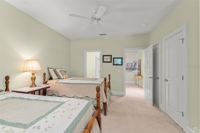 4000 Rouse Rd, Orlando, FL 32817 - bedroom featuring baseboards, visible vents, a ceiling fan, and light carpet
