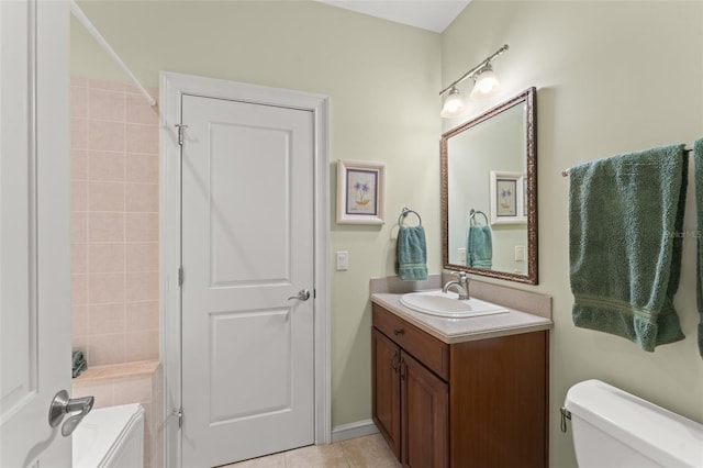 4000 Rouse Rd, Orlando, FL 32817 - bathroom with tile patterned floors, toilet, and vanity