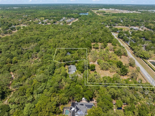 4000 Rouse Rd, Orlando, FL 32817 - bird's eye view featuring a wooded view