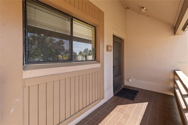 view of exterior entry featuring stucco siding