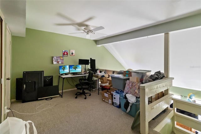 office space with carpet flooring, ceiling fan, lofted ceiling with beams, and baseboards