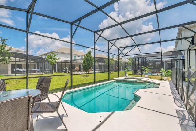 2616 Calistoga Ave, Kissimmee, FL 34741 - view of swimming pool with a lawn, a lanai, a pool with connected hot tub, and a patio