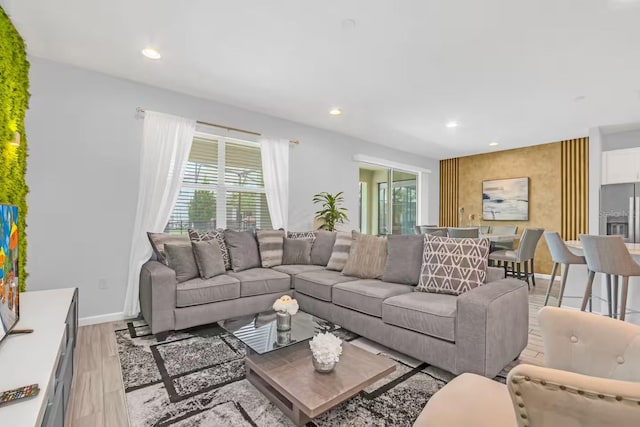 2616 Calistoga Ave, Kissimmee, FL 34741 - living room with recessed lighting, light wood-style floors, and baseboards