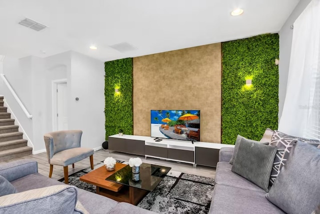 2616 Calistoga Ave, Kissimmee, FL 34741 - living room featuring recessed lighting, stairway, visible vents, an accent wall, and baseboards