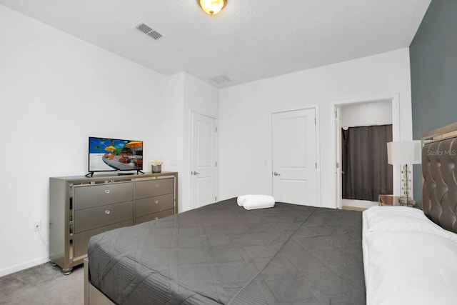 2616 Calistoga Ave, Kissimmee, FL 34741 - bedroom featuring visible vents, baseboards, and light carpet