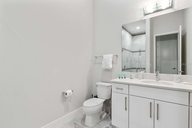 bathroom with toilet, baseboards, marble finish floor, a shower stall, and vanity