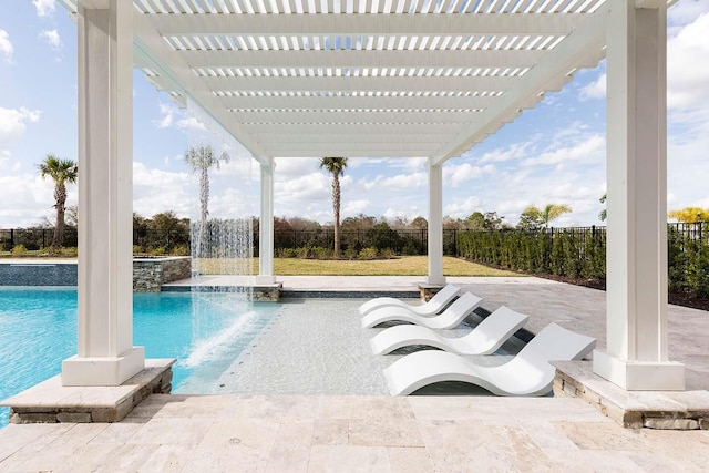 view of pool featuring a fenced backyard, a pergola, a patio area, and a pool with connected hot tub