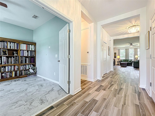 865 Bay Bridge Cir, Apopka, FL 32703 - hallway with wood finished floors and baseboards