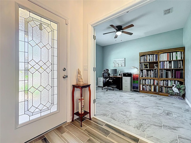 865 Bay Bridge Cir, Apopka, FL 32703 - foyer entrance with wood finished floors and a ceiling fan