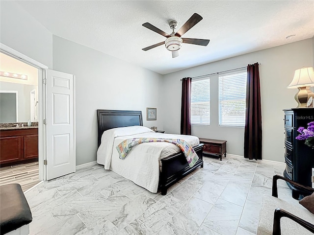 865 Bay Bridge Cir, Apopka, FL 32703 - bedroom with light marble finish flooring, ensuite bath, baseboards, and a textured ceiling
