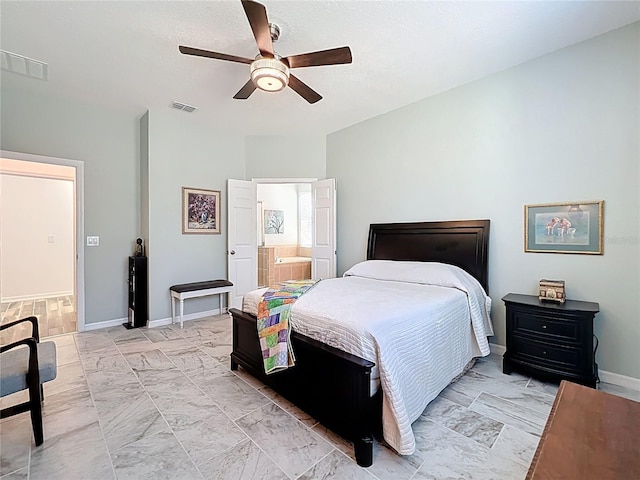 865 Bay Bridge Cir, Apopka, FL 32703 - bedroom featuring baseboards, a ceiling fan, light marble finish floors, and ensuite bath