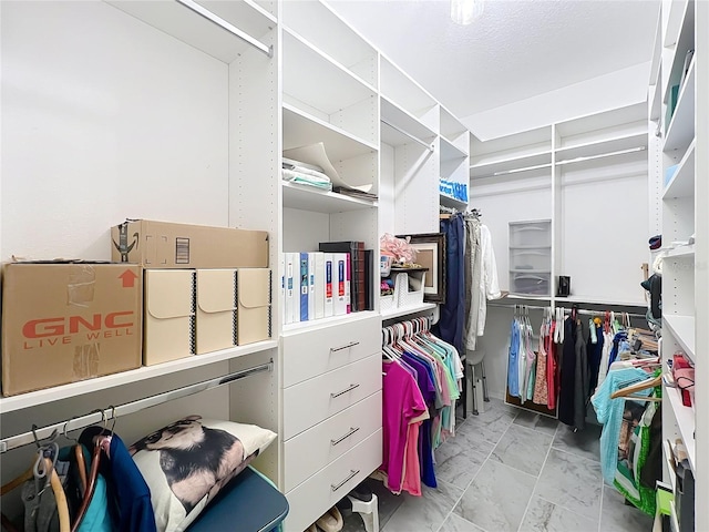 865 Bay Bridge Cir, Apopka, FL 32703 - walk in closet featuring marble look tiles