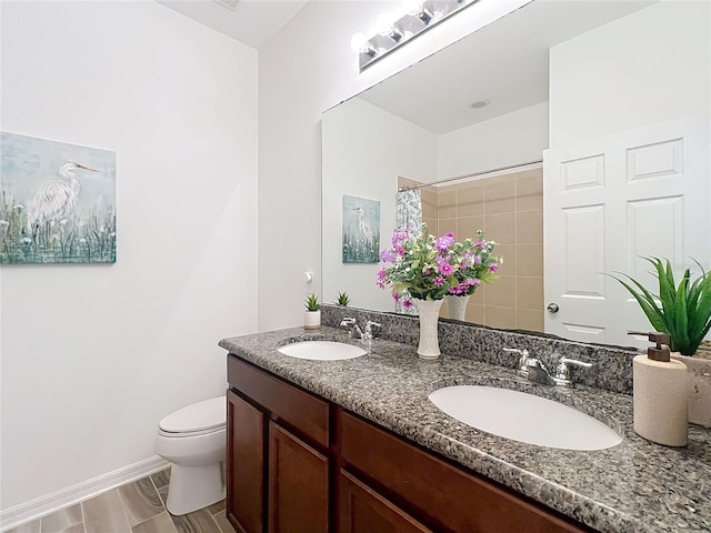865 Bay Bridge Cir, Apopka, FL 32703 - bathroom featuring double vanity, toilet, a shower with shower curtain, and baseboards