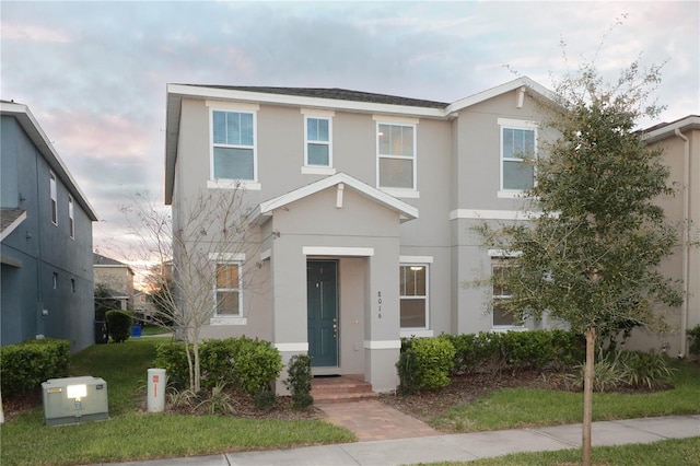 view of front of home with stucco siding
