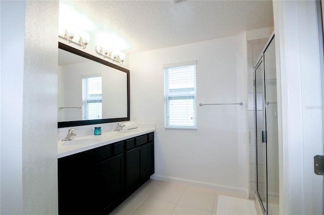 full bath featuring a shower stall, plenty of natural light, and a sink