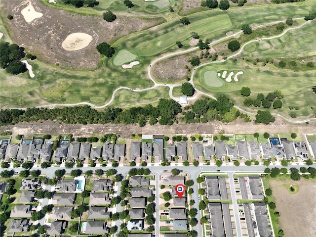 aerial view featuring a residential view and view of golf course
