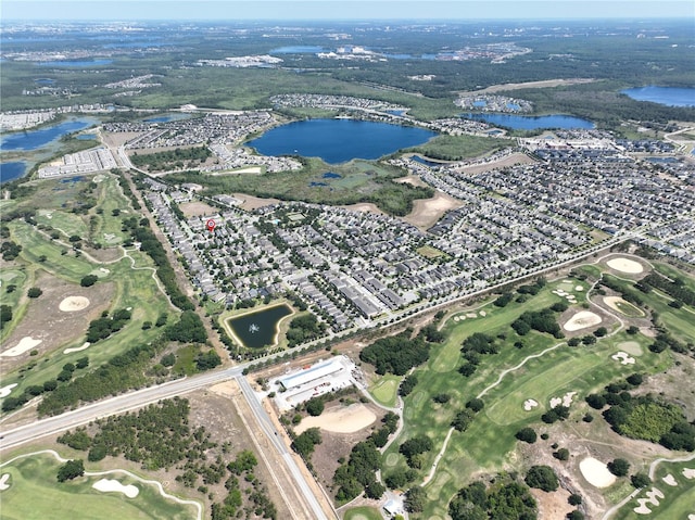 bird's eye view with golf course view and a water view