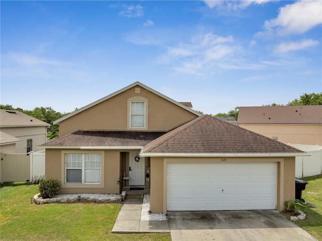 5118 Luna Negra Dr, Orlando, FL 32811 - view of front of house featuring a shingled roof, stucco siding, and fence