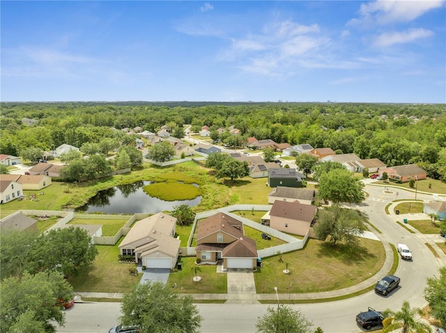 5118 Luna Negra Dr, Orlando, FL 32811 - birds eye view of property with a residential view, a view of trees, and a water view